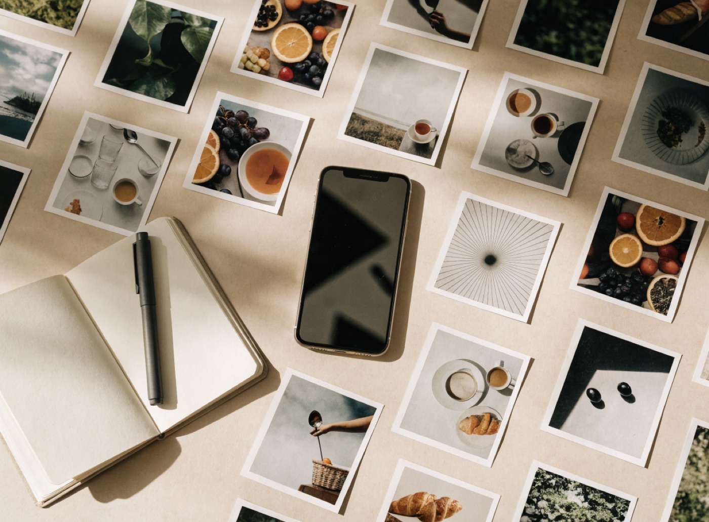 Printed content cards and a phone laid out on a desk