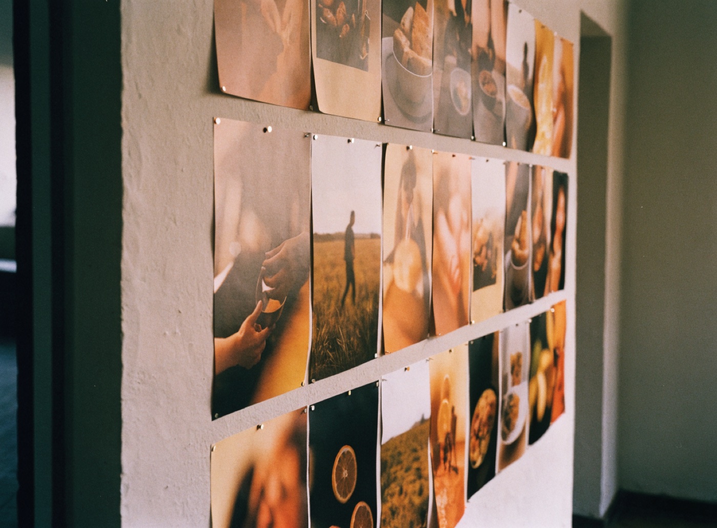 A studio wall of printed social media posts