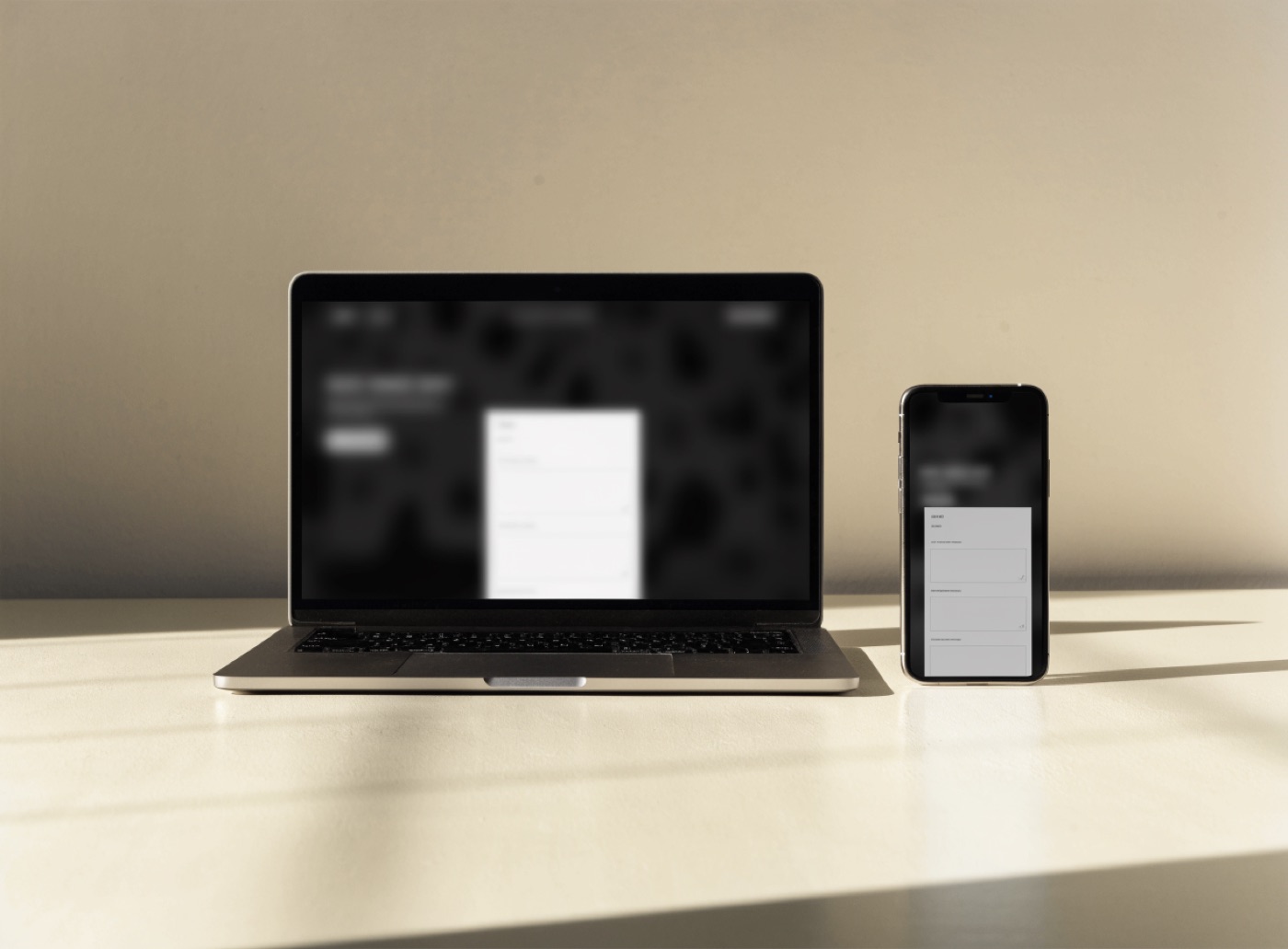A website shown on a laptop and a phone